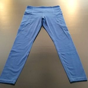 Athleta Stash Pocket Salutation Leggings, small